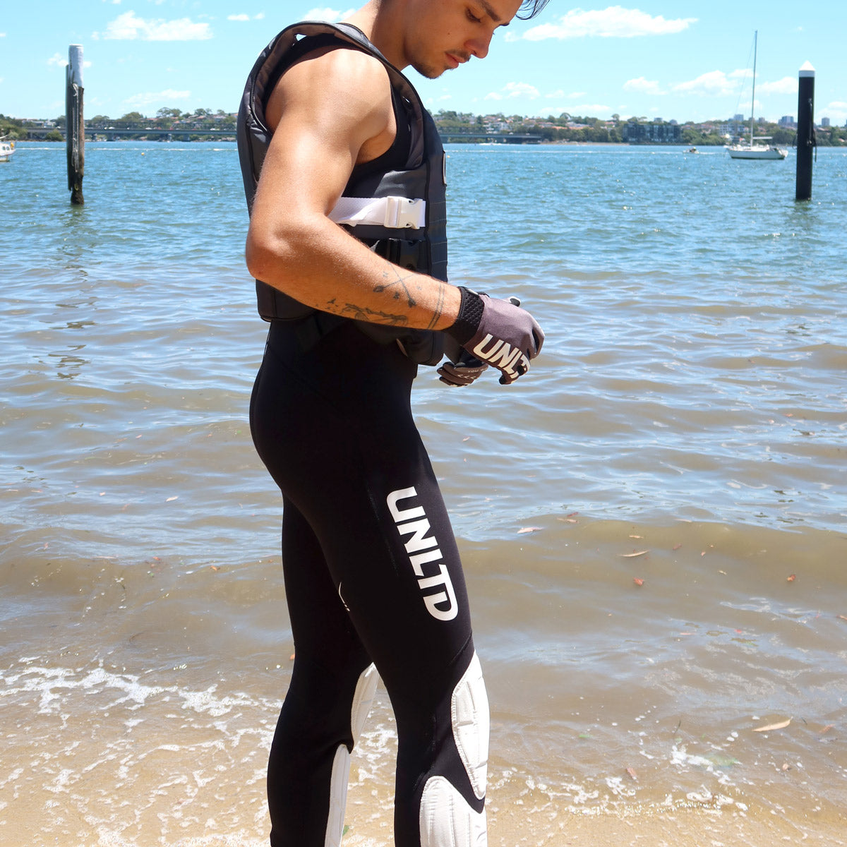 Unlimited PWC Flead wetsuit John, a full-body neoprene wetsuit with a sleek black design, ideal for water sports and jetski.