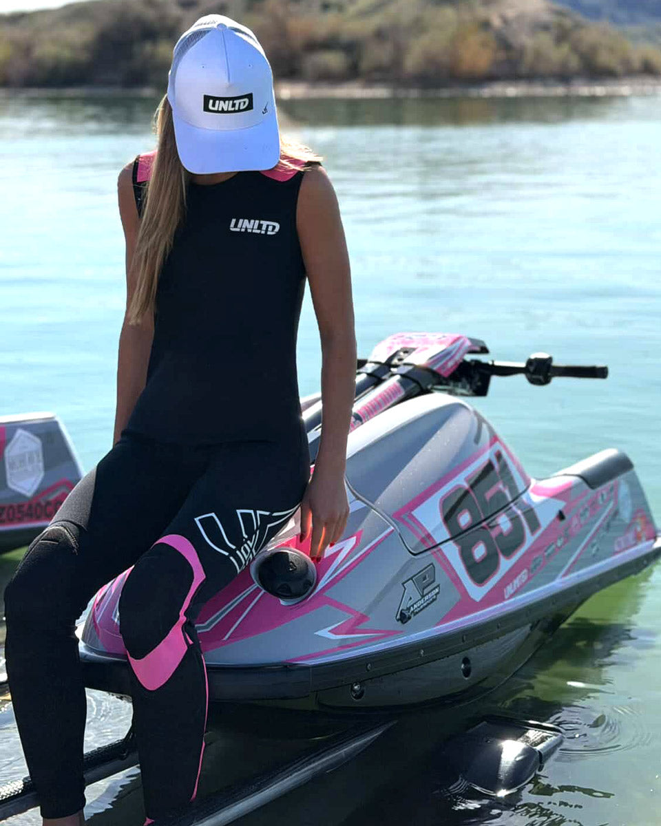 Unlimited PWC Hybrid wetsuit, John model, showing the full suit with black and pink design, designed for water sports and jetski.