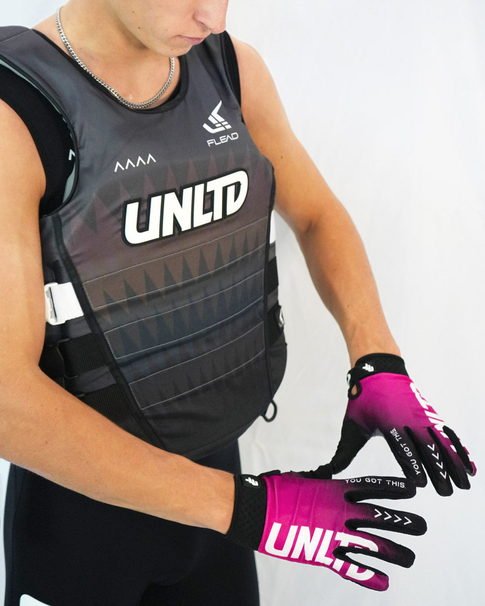 Black Hydro X gloves from Unlimited PWC designed for water sports, featuring a snug fit and textured grip for enhanced performance.