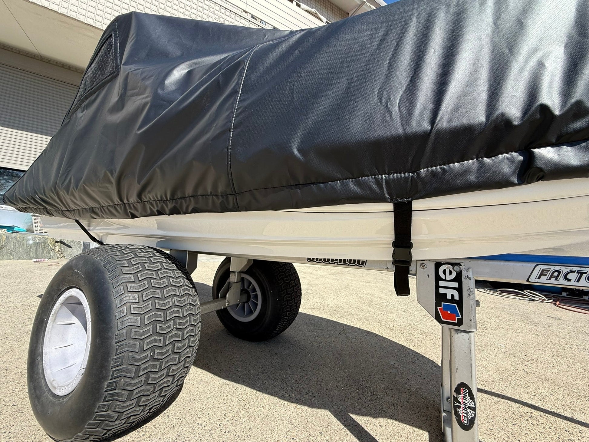 UNLIMITED-PWC PWC cover for GP1, GP1R, F1, and F16 hulls, designed to protect personal watercraft during storage or transport.