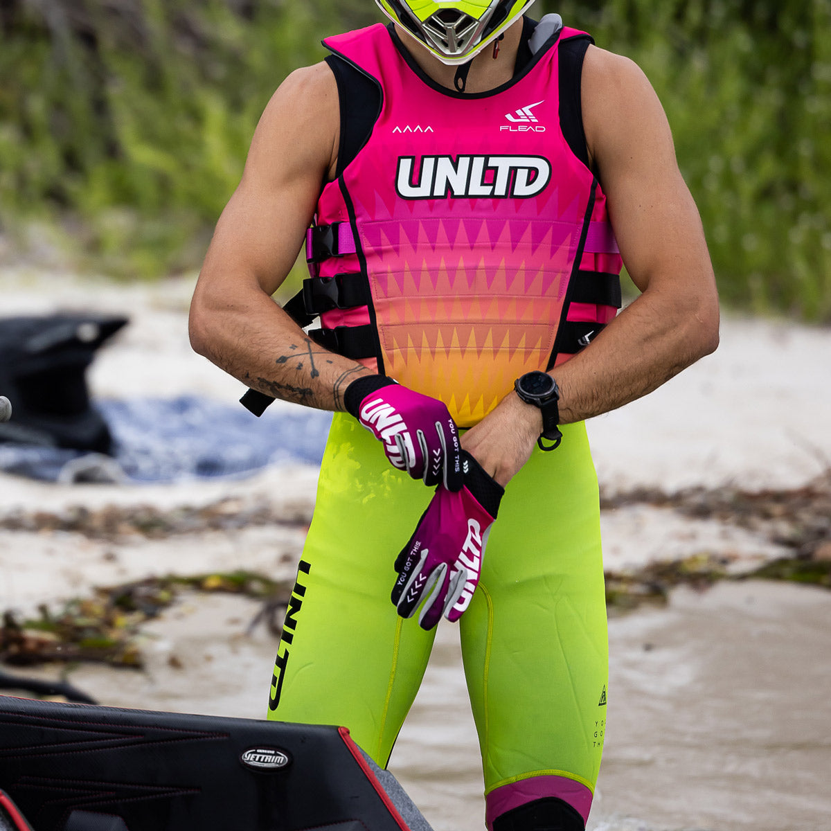 Unlimited PWC Hydro X gloves, pink neoprene with reinforced palms, designed for water sports and jet skiing.