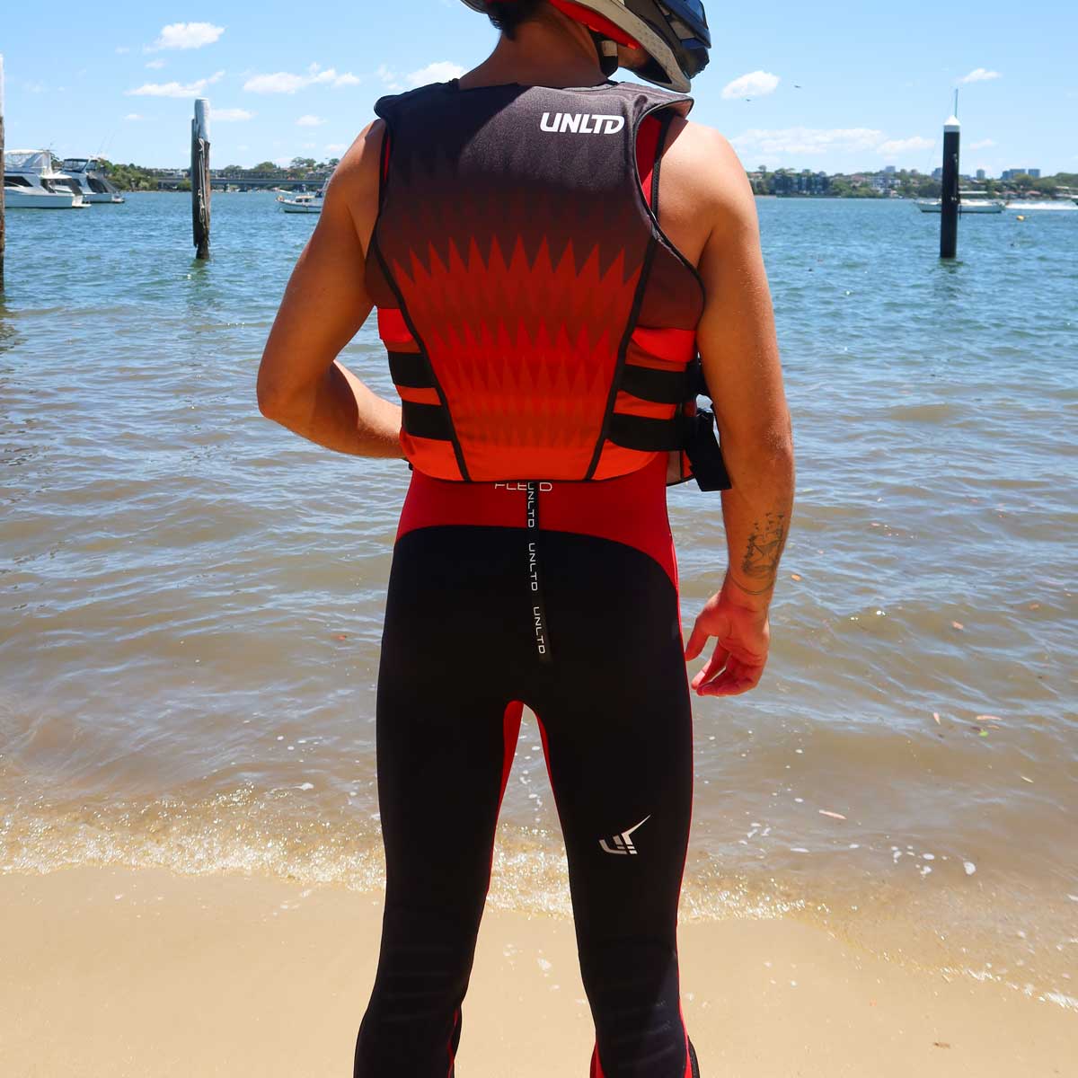 Unlimited PWC Flead S/E Life Vest with adjustable straps and bright red color, designed for safety and comfort during water activities.
