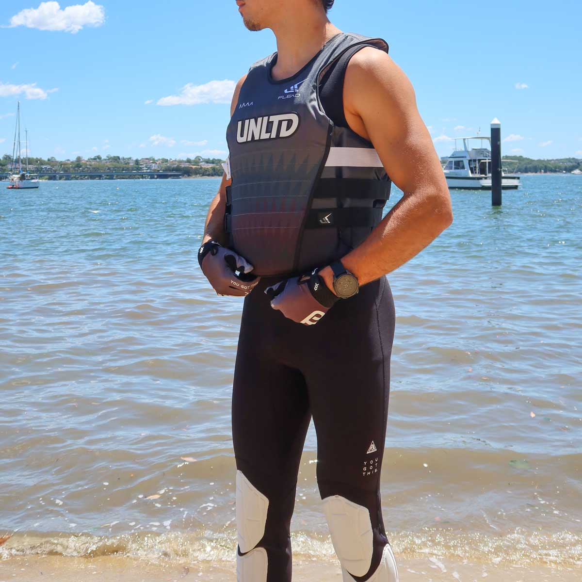 Unlimited PWC FLEAD S/E Life Vest with adjustable straps and clean black color for safety and visibility.