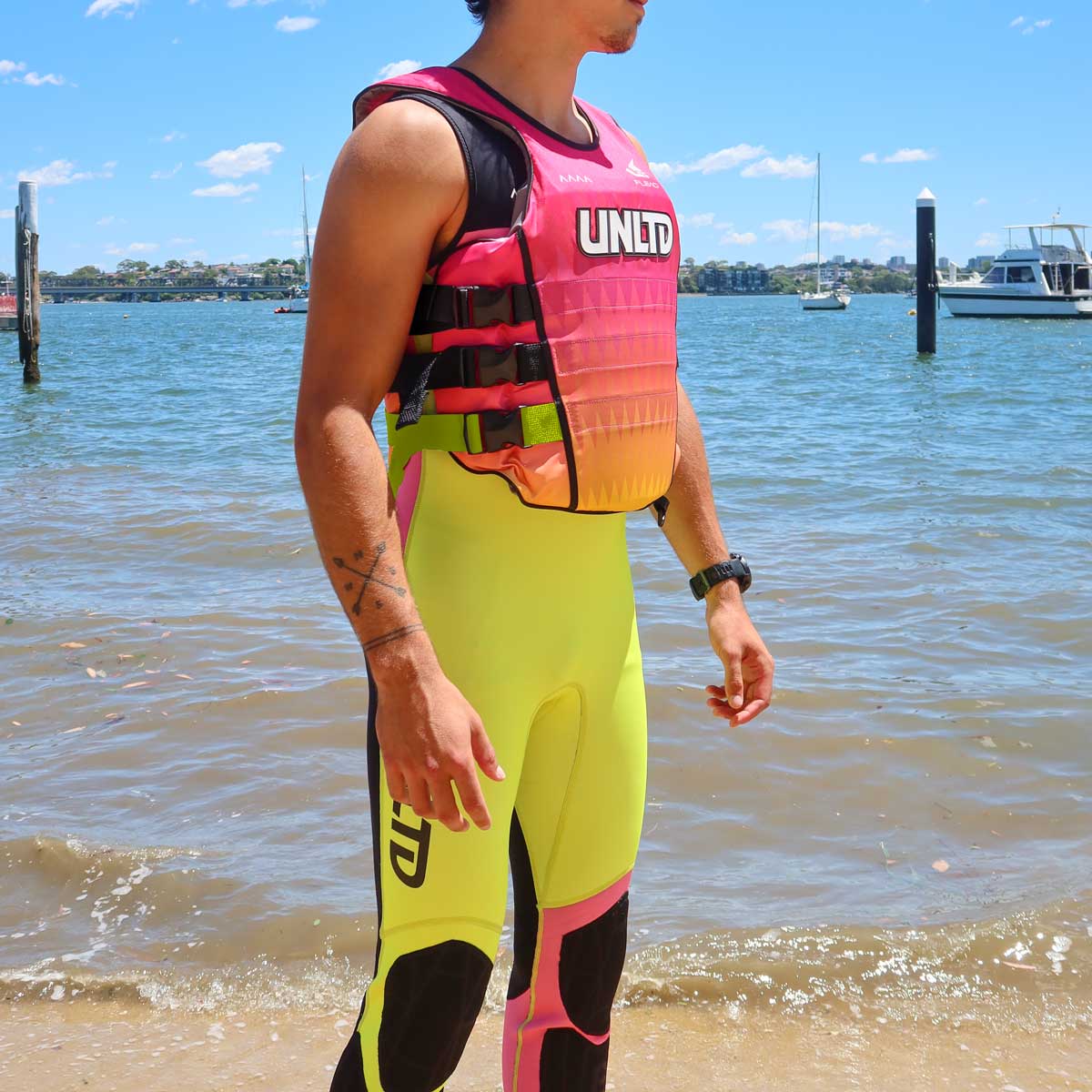 Unlimited PWC FLEAD S/E Life Vest, pink personal flotation device with adjustable straps and reflective details for safety.